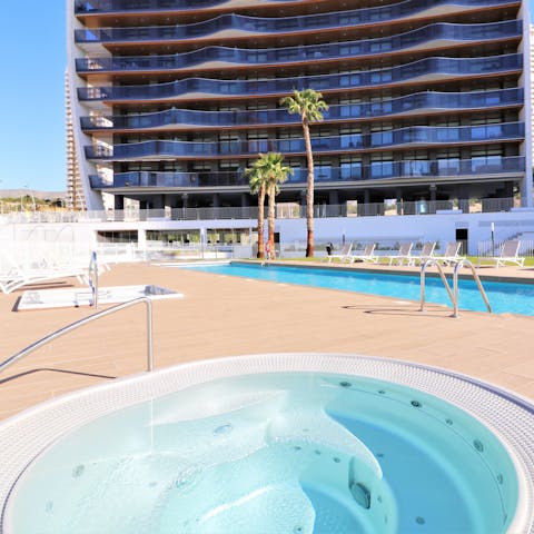 Enjoy a cooling swim in the shared outdoor pool, or a relaxing dip in the communal hot tubs
