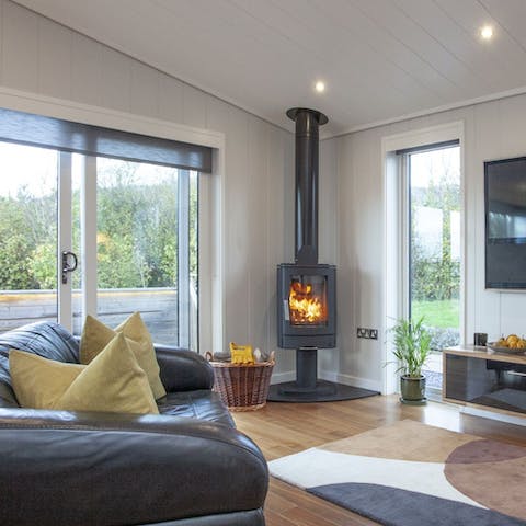 Snuggle up in front of the log burner on cooler evenings