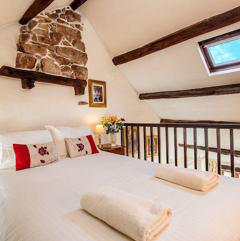 Feel like you're living in your own fairy tale amidst the stone walls and exposed wooden beams 