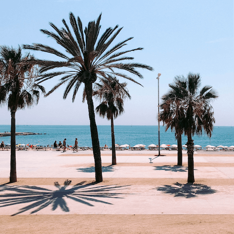 Squeeze in an afternoon at Barceloneta Beach, within walking distance