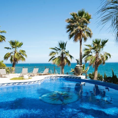 Cool-off with a refreshing dip in the shared swimming pool 