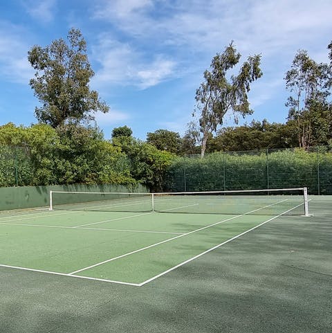 Keep active on your holiday with a game of tennis on the communal court