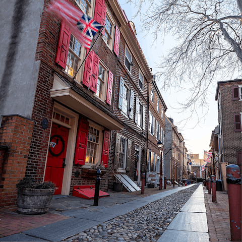 Wander down Elfreth's Alley, lined with 18th-century rowhouses, a six-minute walk away