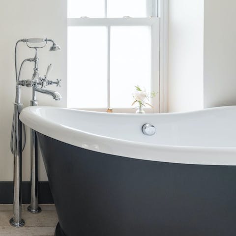 Sneak away to the freestanding slipper bath for a luxurious soak