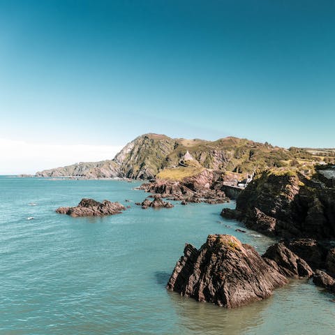 Drive twenty-two minutes to Ilfracombe Beach to build sandcastles