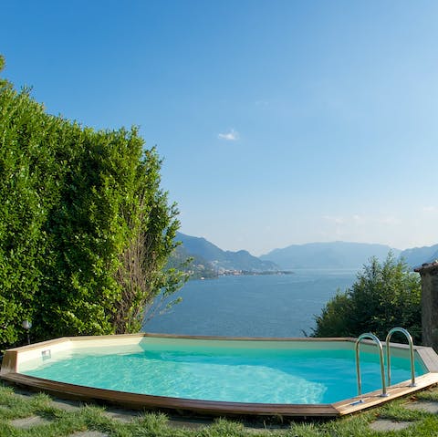 Take a refreshing dip in the private pool overlooking the lake 