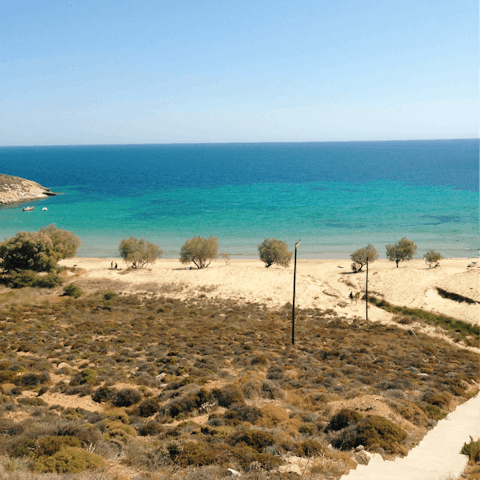 Sink your feet into the sand at nearby Kontogialos beach