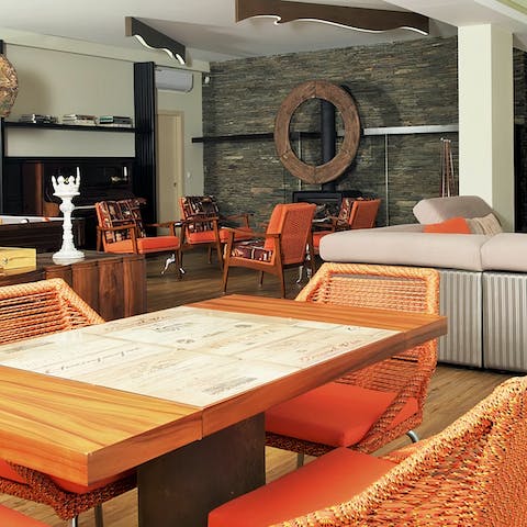 Enjoy rustic open-plan living and artistic design in the games room, with plenty to do
