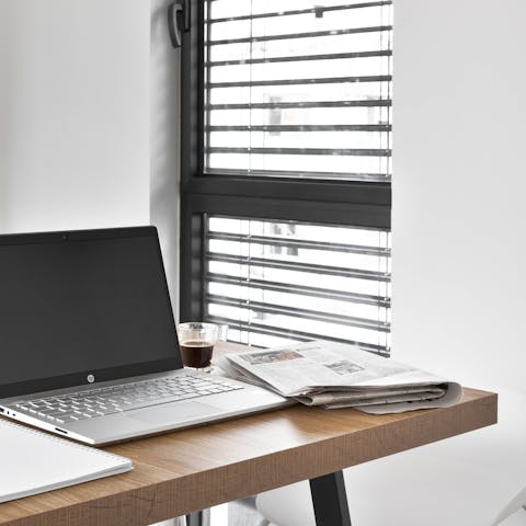 Catch up on work or simply enjoy a morning cup of coffee at the dining table