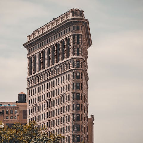 Visit the iconic Flatiron Building, a ten-minute stroll from your door