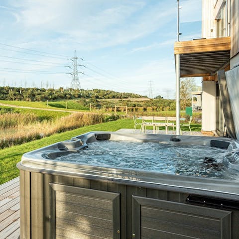 Embrace the natural elements from the warmth of the hot tub