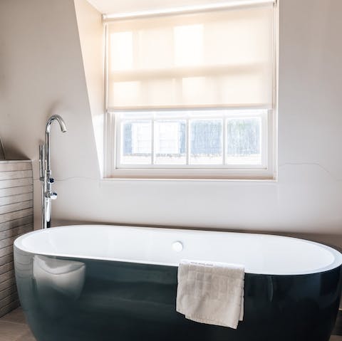 Treat yourself to a luxurious soak in the freestanding tub
