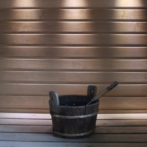 Find total relaxation in your the pool house's sauna, sure to melt away any thoughts of the daily grind