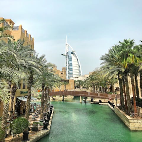 Admire the Burj Al Arab's striking architecture, fifteen minutes away