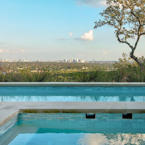 Relish the stunning views over Austin from the pool