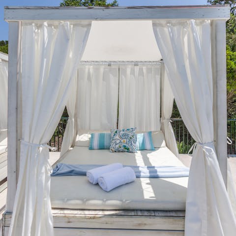 Lie on the day bed and get stuck into a good book as the Spanish sun warms your skin