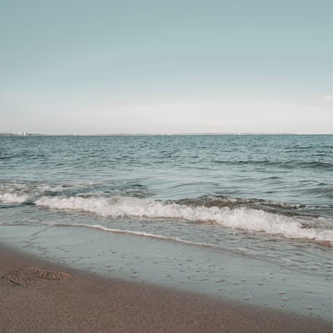 Walk down to the pristine white pebbles of Spilia Beach 