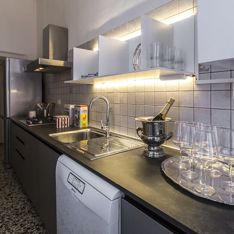 Prepare a homecooked meal, or pour a glass of Prosecco in the contemporary kitchen