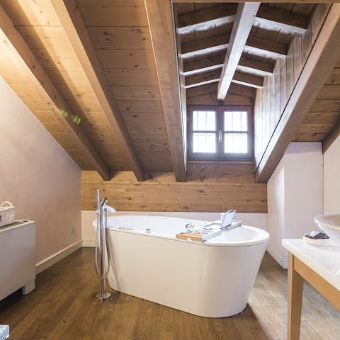 Luxuriate in the standalone bathtub on the highest floor