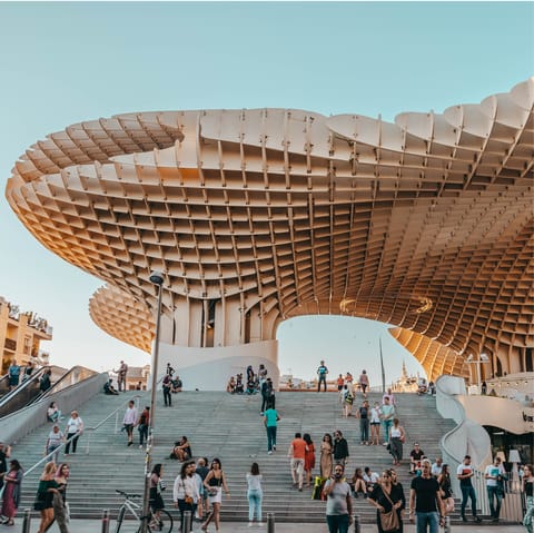 Enjoy a walk around Setas de Sevilla, directly in front of the apartment