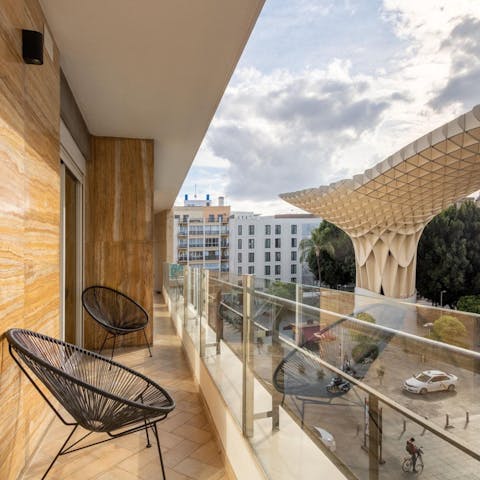 Sip your morning coffee as you gaze out at La Encarnación square