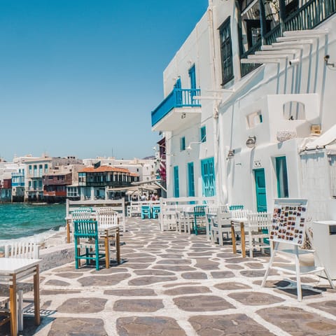 Make a reservation for lunch at a seaside taverna