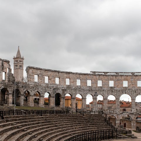 Tour the city of Pula with its stunning preserved Roman amphitheatre that dominates the cityscapes