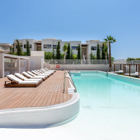 Soak up the Spanish sun from in or beside the communal pool