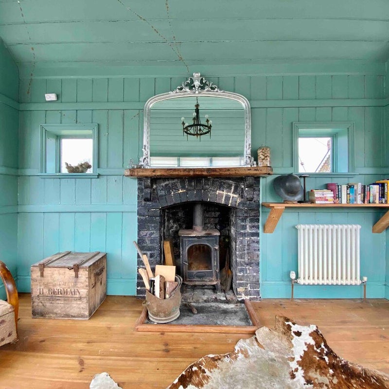 Cosy up in the delightfully rustic living area