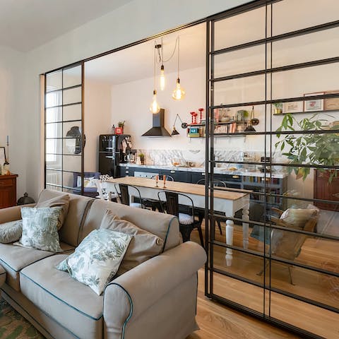 Slide open the crittall-style doors and expand your communal space