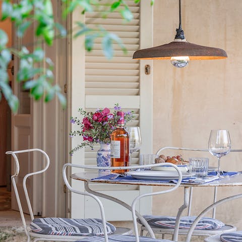 Enjoy an alfresco lunch or bottle of wine on the patio