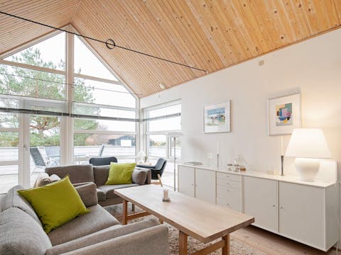 Sit back, relax and fall in love with the lofty A-frame ceilings in the light-filled lounge