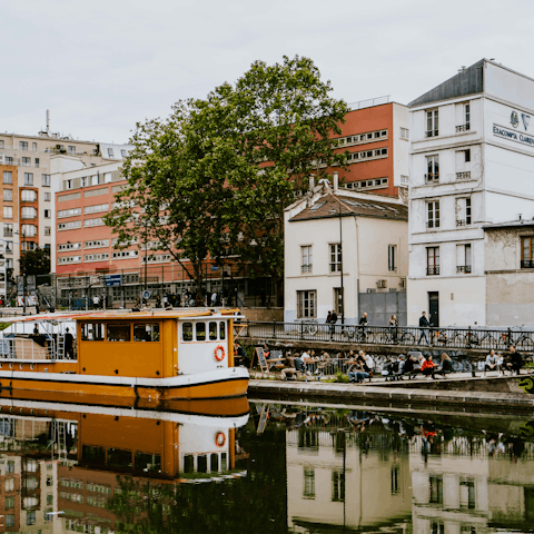 Explore Canal Saint-Martin, less than a kilometre away