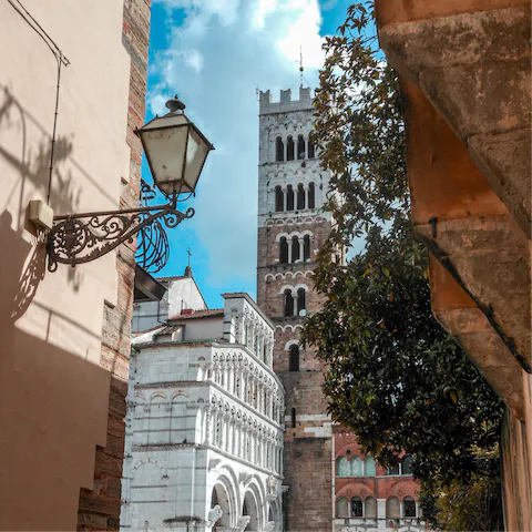 Visit lovely Lucca and spend time exploring its atmospheric streets