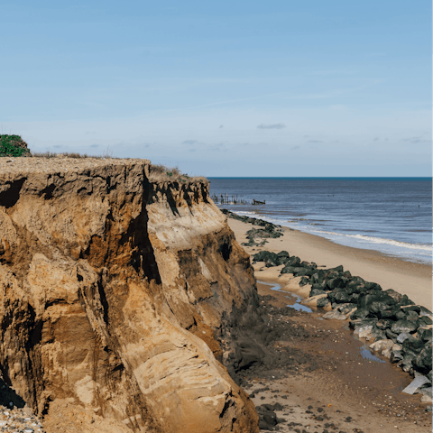 Hike part of the Norfolk Coastal Path through an Area of Outstanding Natural Beauty
