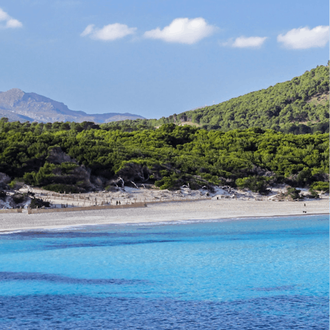 Spend the day on the gleaming white sands of Playa de Muro, just over a thirty-minute drive away