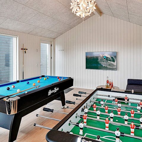 Spend time in the games room playing foosball and pool