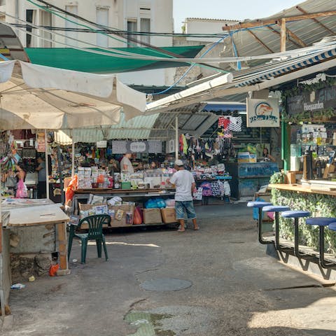 Tuck into bourekas at Carmel Market, a five-minute stroll from your doorstep