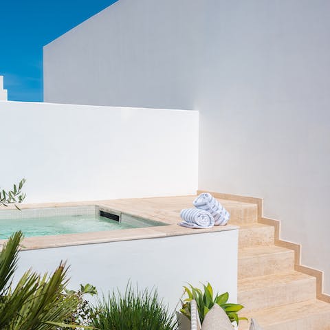 Escape the Ibiza heat in the calm pool water
