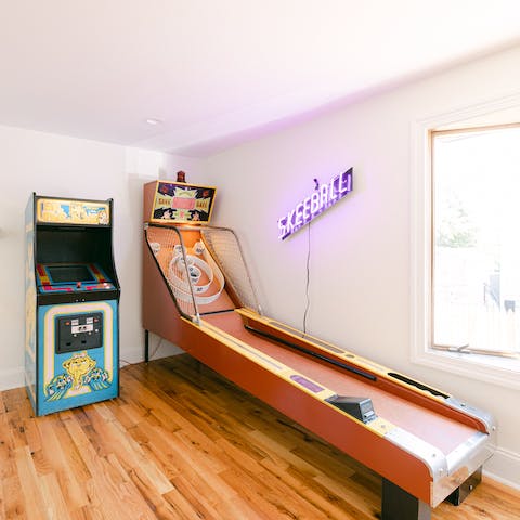 Test your Skeeball skills in this retro games room, complete with arcade machine