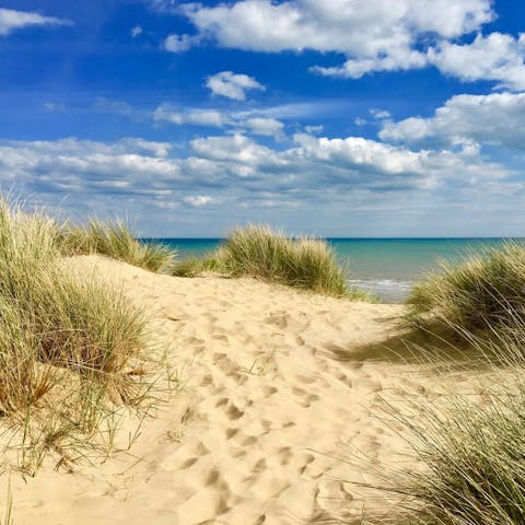 Spend afternoons at Camper Sands beach, a ten-minute walk away