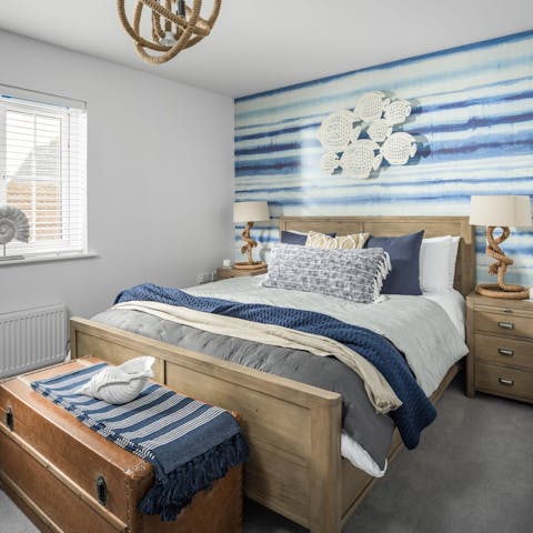 Wake up feeling relaxed and rested in the beautiful nautical-themed bedrooms