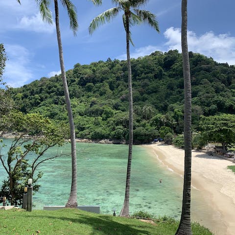 Spend your days on the white sands of Tri Trang Beach, a short walk away