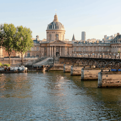 Cross the Pont des Arts and head towards the Louvre