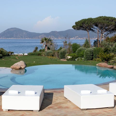 Soak up views of the Tyrrhenian Sea as you lounge by the pool