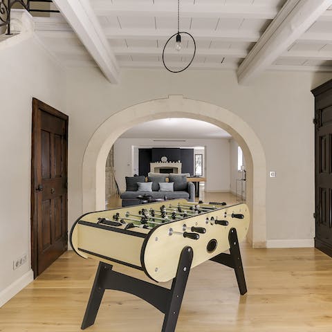 Challenge your guests to a lively game of table football