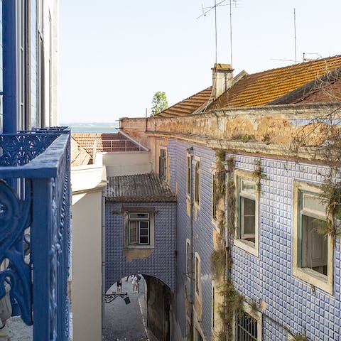 Catch glimpses of the River Tagus from your Juliet balcony