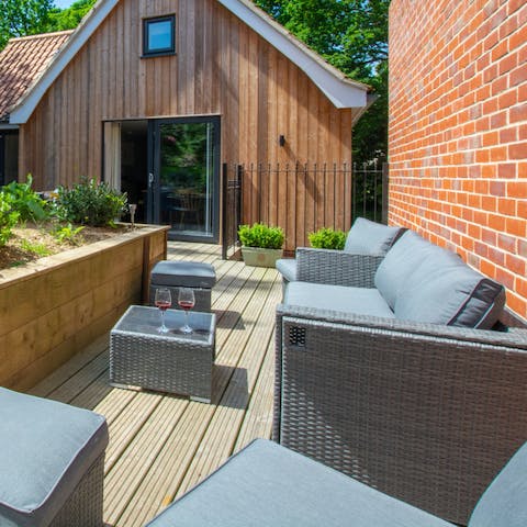 Sip wine in the evenings on the garden furniture