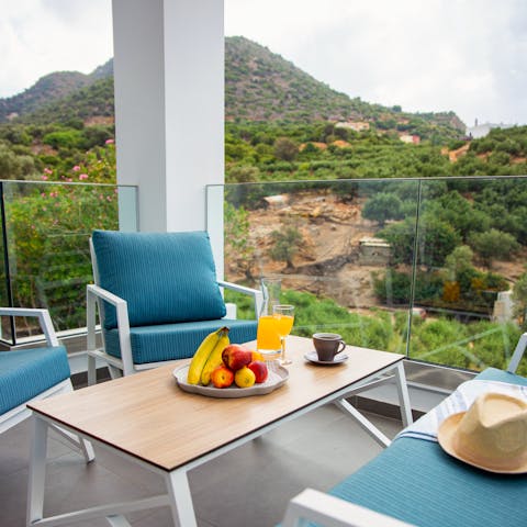 Sip a cup of strong Greek coffee as you soak up the scenery from the balcony
