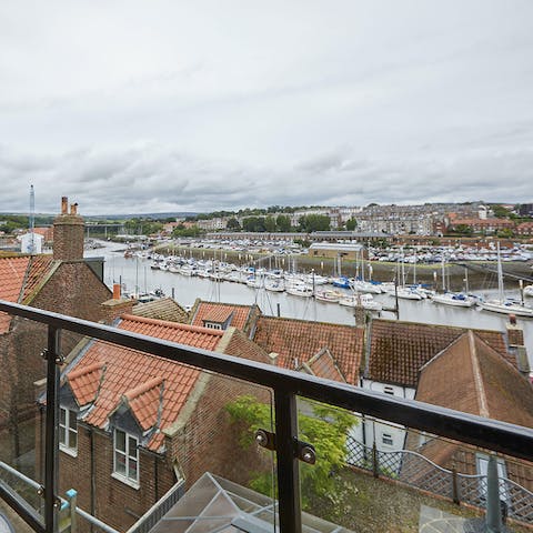 Admire harbour views from the balcony